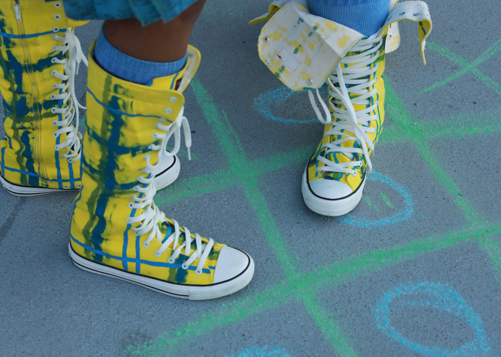 Hand-painted plaid hi-top sneakers on a chalk-drawn hopscotch board